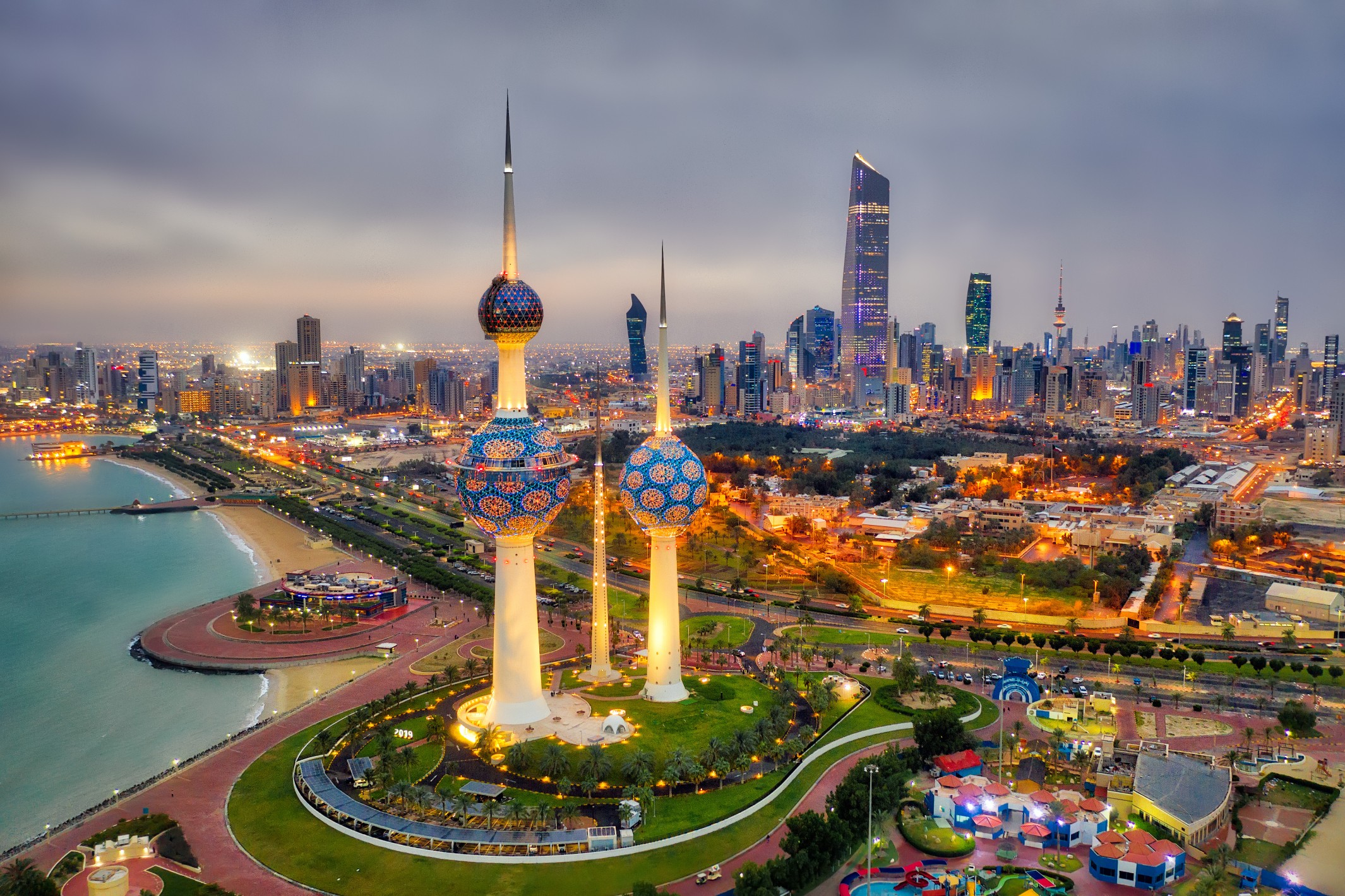Kuwait City skyline and Kuwait Towers featured in unique dress codes around the world travel guide