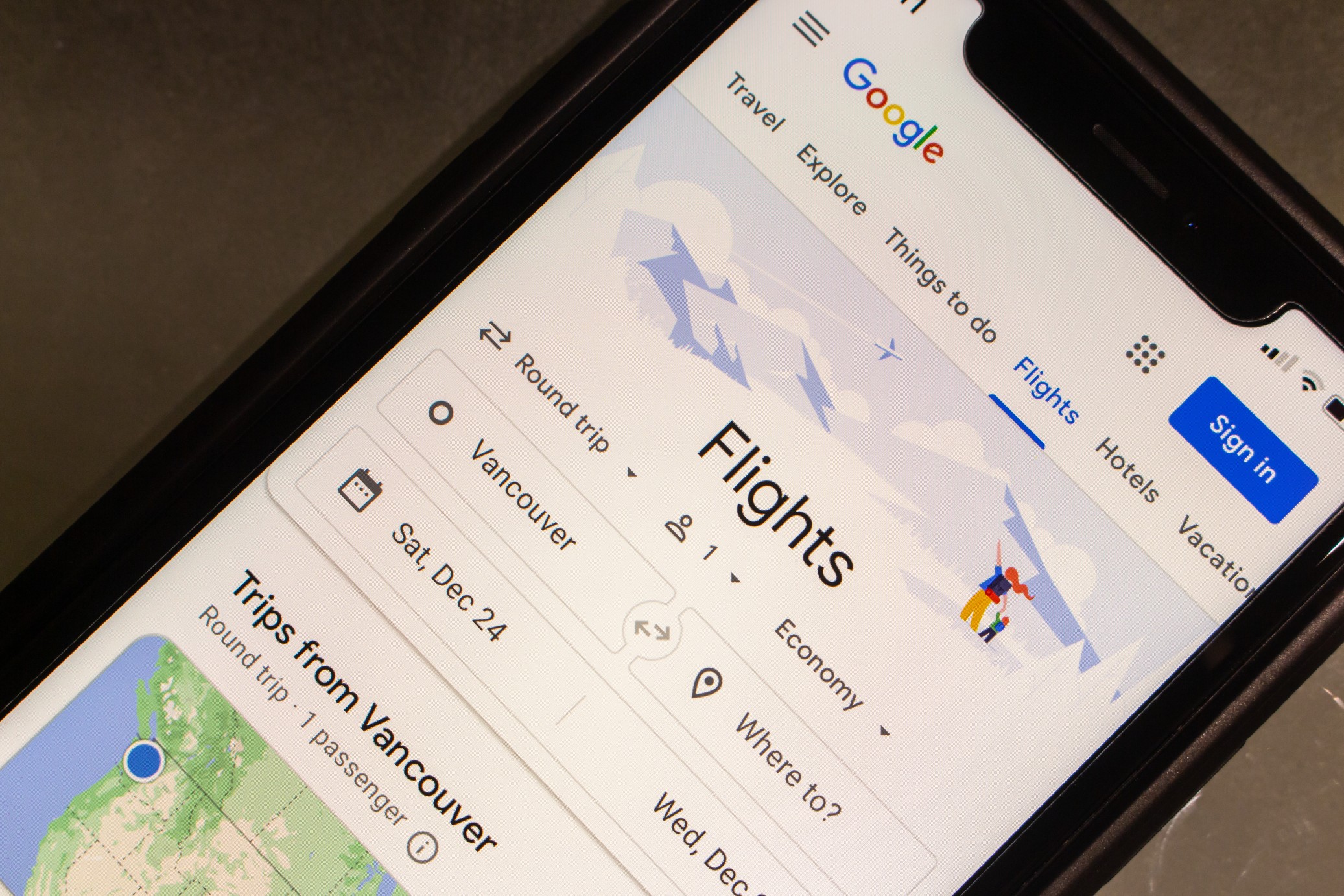Website of Google Flights seen in iPhone. Google Flights is an online flight booking search service for the purchase of airline tickets through third-party suppliers