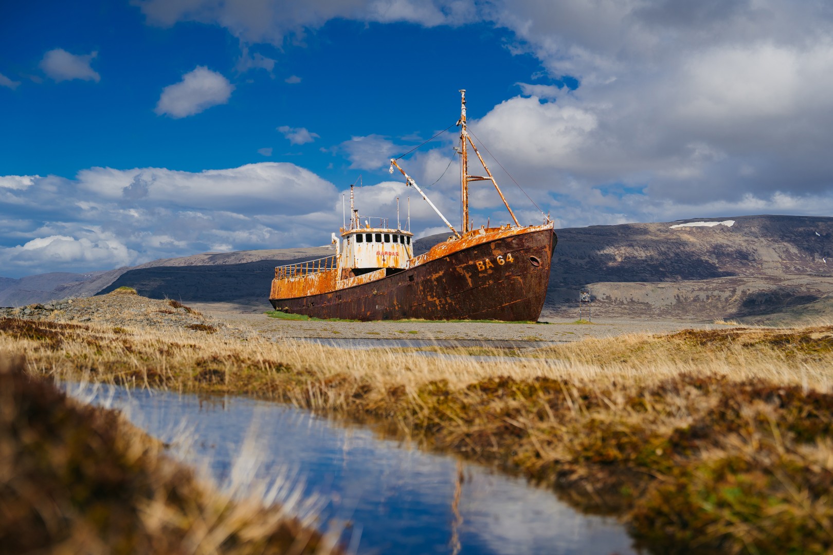 Old shipping boat, Gardar BA 64, shipwrecked aground in the Westfjords of Iceland