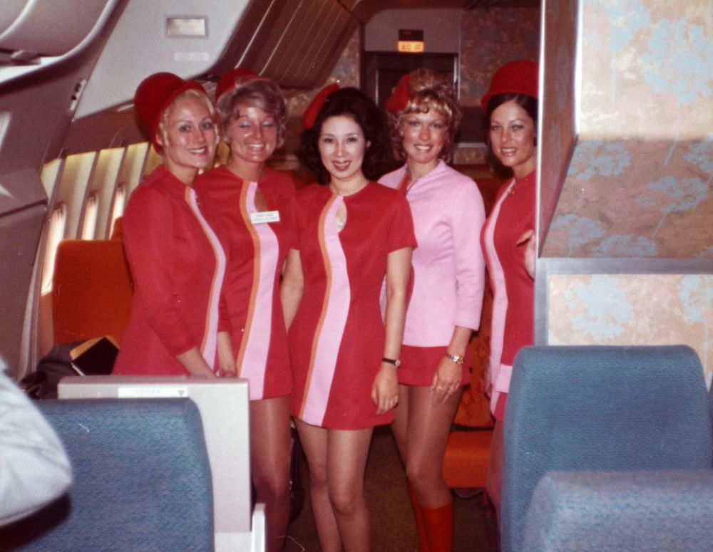 Vintage flight attendants aboard classic airline representing gone but not forgotten airlines