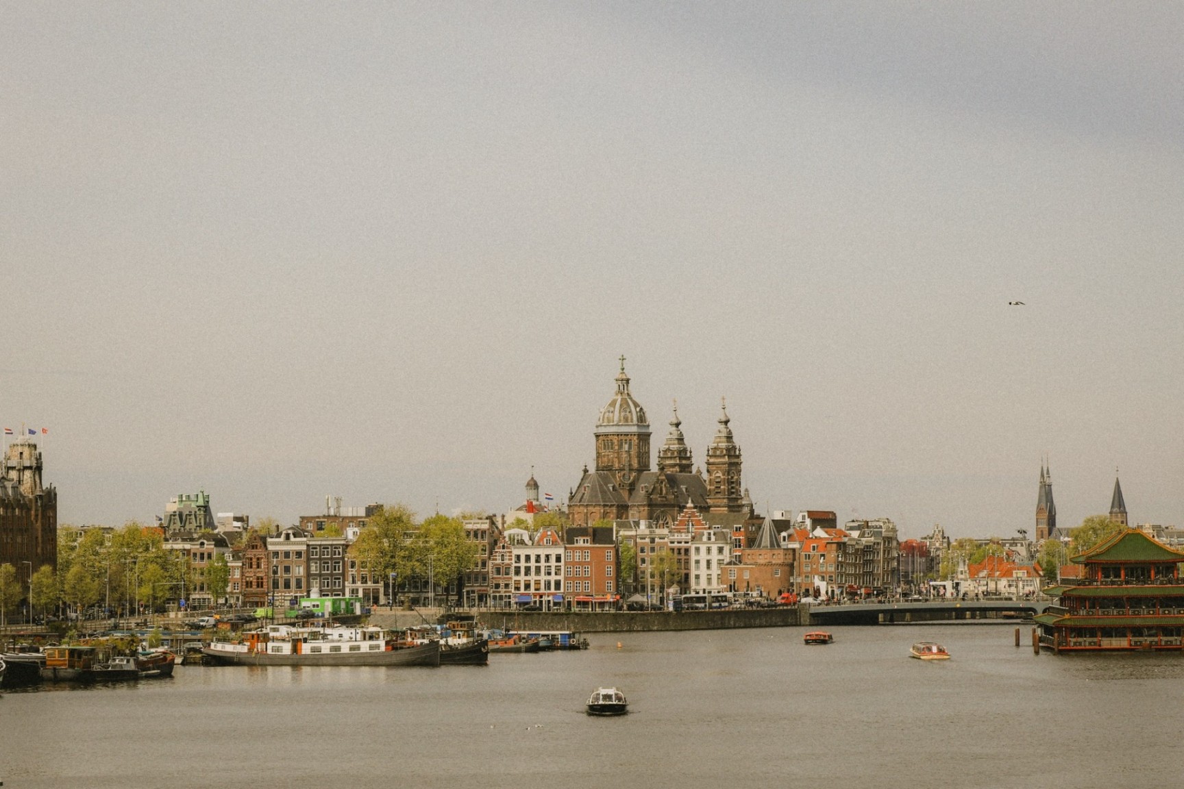 Amsterdam skyline and waterfront illustrating globalization and modern urban tourism trends